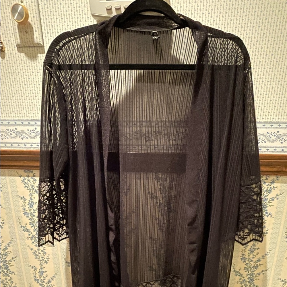 Lacey,short duster.sheer, could  be lingerie piece or cute swimsuit cover-up.